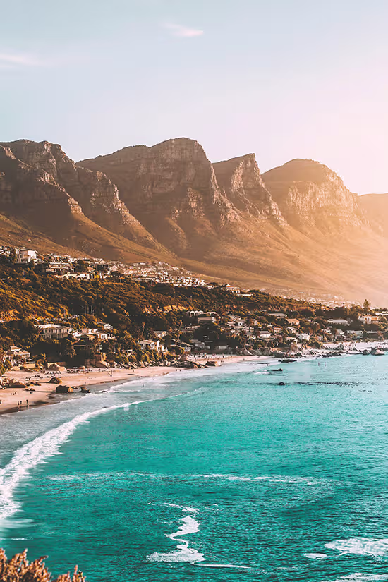 image of beach against mountains